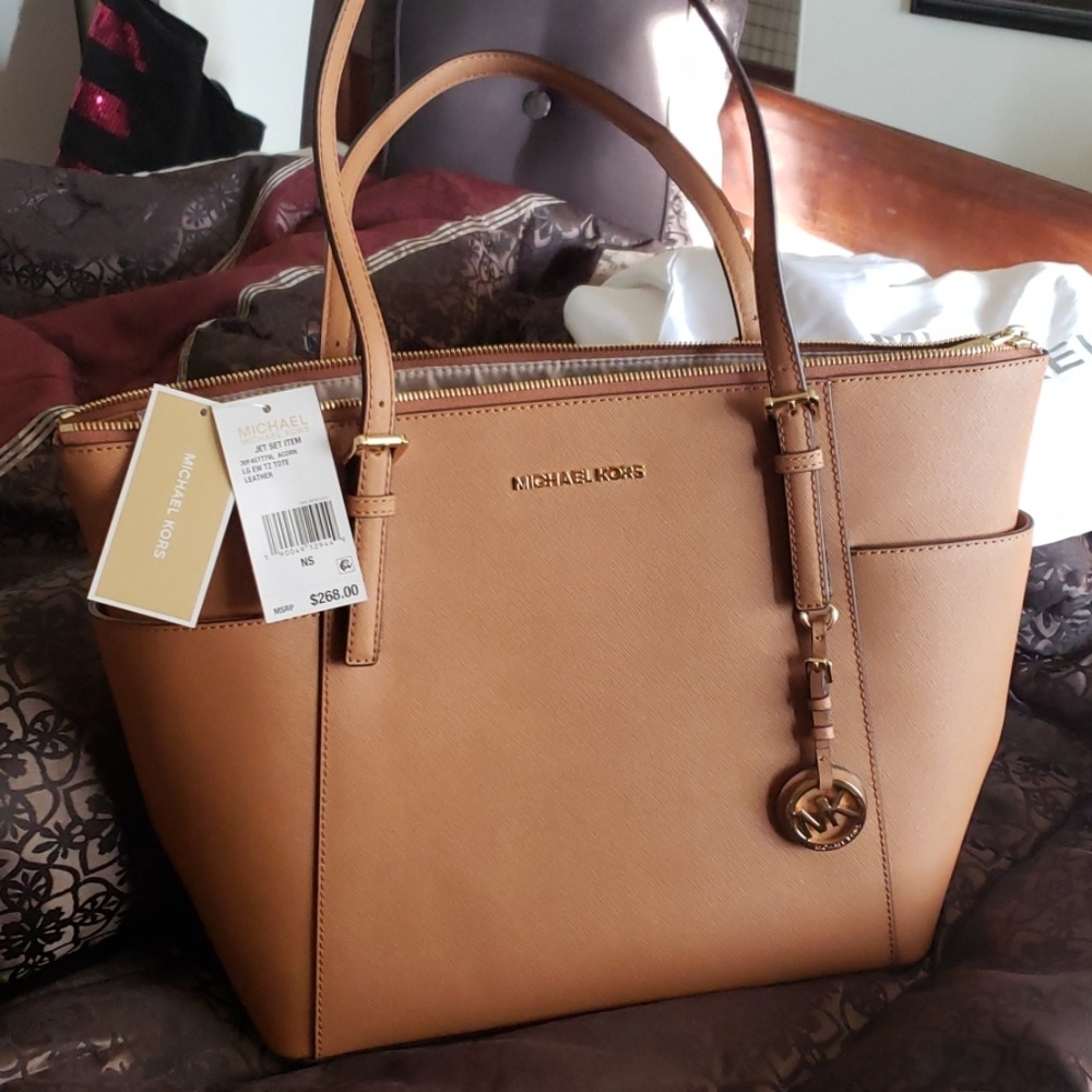 Used Large Michael Kors jet set tote purse